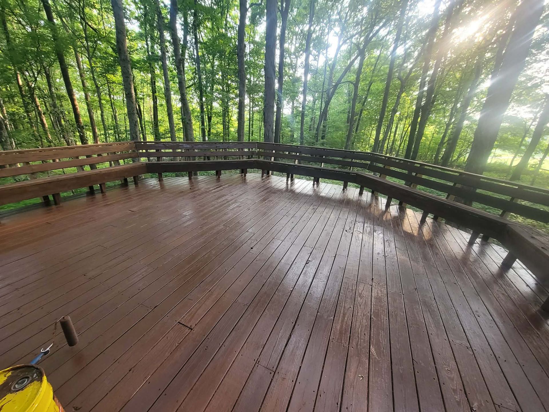 Clean deck with benches in sunlight